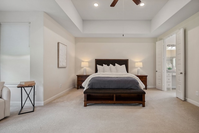 4051 Ashland Woods Dr, Spring, TX 77386 - bedroom featuring light carpet, a tray ceiling, baseboards, ceiling fan, and recessed lighting