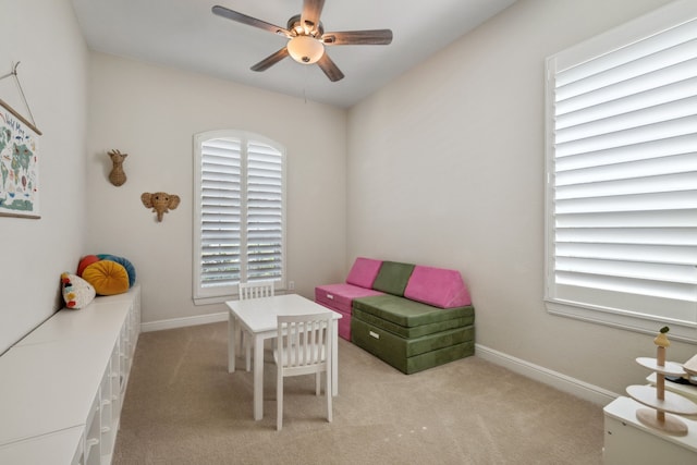 4051 Ashland Woods Dr, Spring, TX 77386 - recreation room with ceiling fan, light carpet, and baseboards