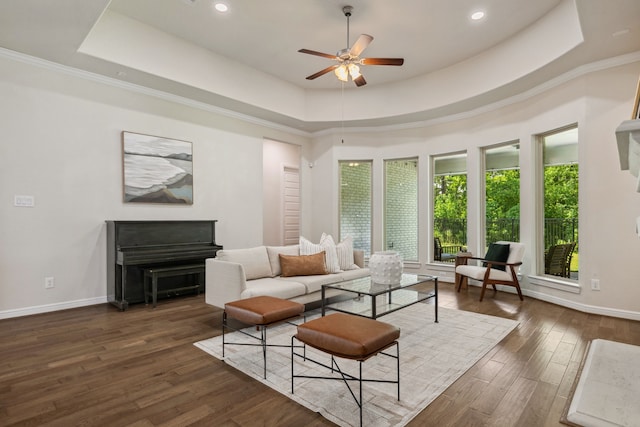 4051 Ashland Woods Dr, Spring, TX 77386 - living room with a tray ceiling, a ceiling fan, baseboards, wood finished floors, and recessed lighting