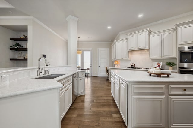 4051 Ashland Woods Dr, Spring, TX 77386 - kitchen featuring a sink, backsplash, dark wood-style floors, ornamental molding, and recessed lighting