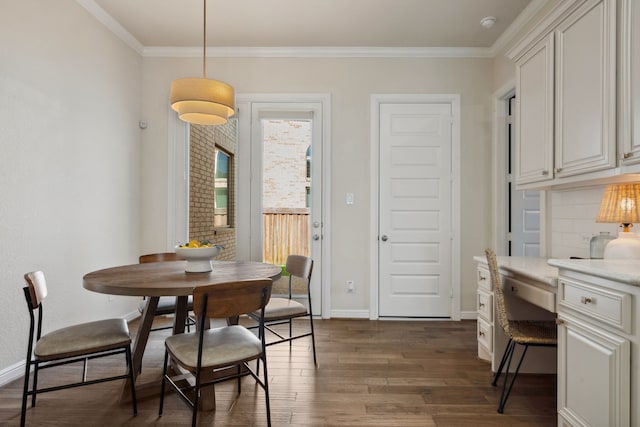4051 Ashland Woods Dr, Spring, TX 77386 - dining room featuring dark wood finished floors, crown molding, and baseboards