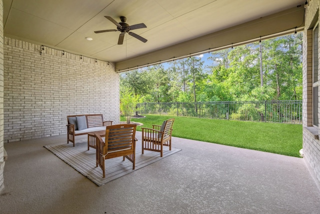 4051 Ashland Woods Dr, Spring, TX 77386 - view of patio / terrace featuring ceiling fan, an outdoor living space, and view of scattered trees
