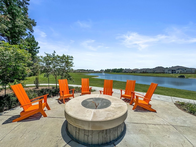 4051 Ashland Woods Dr, Spring, TX 77386 - view of patio / terrace featuring a fire pit and a water view