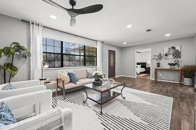7280 Click Dr, Beaumont, TX 77708 - living area featuring recessed lighting, a ceiling fan, wood finished floors, baseboards, and a textured ceiling