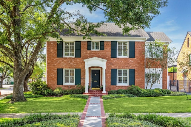 2256 Dryden Rd, Houston, TX 77030 - view of front of home with brick siding and a shingled roof