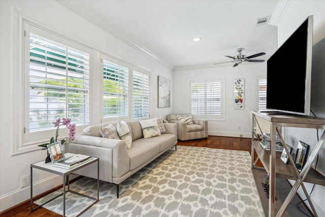 2256 Dryden Rd, Houston, TX 77030 - living room featuring baseboards, crown molding, a ceiling fan, wood finished floors, and recessed lighting