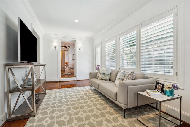 2256 Dryden Rd, Houston, TX 77030 - living room featuring wood finished floors, baseboards, crown molding, a chandelier, and recessed lighting