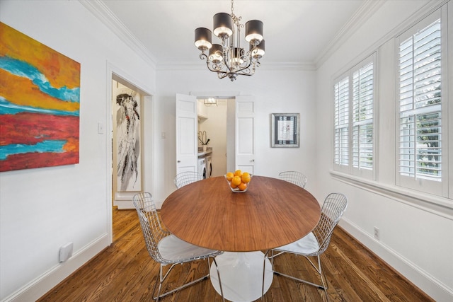 2256 Dryden Rd, Houston, TX 77030 - dining space featuring a chandelier, wood finished floors, baseboards, and ornamental molding