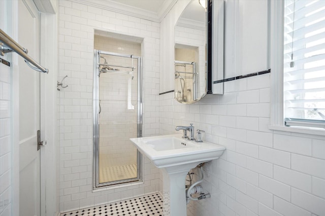 2256 Dryden Rd, Houston, TX 77030 - full bathroom featuring ornamental molding, a stall shower, and tile walls