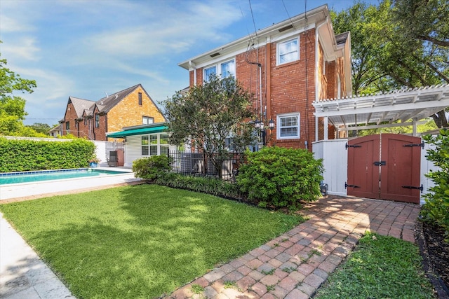 2256 Dryden Rd, Houston, TX 77030 - rear view of property with brick siding