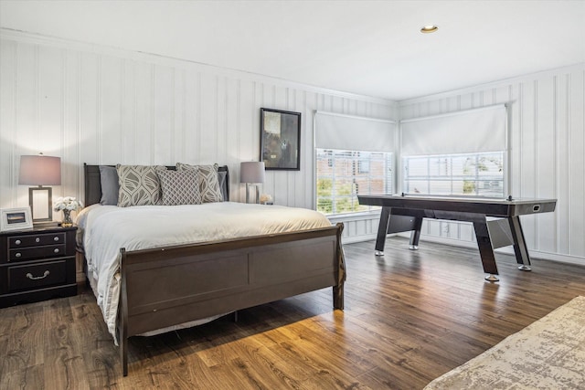 2256 Dryden Rd, Houston, TX 77030 - bedroom with wood finished floors, ornamental molding, and a decorative wall