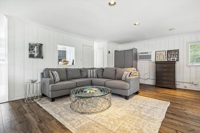 2256 Dryden Rd, Houston, TX 77030 - living room with crown molding, dark wood-style flooring, and an AC wall unit