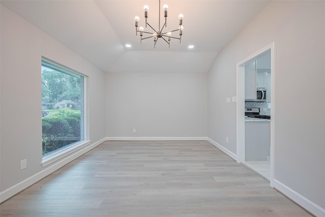 8314 Burning Hills Dr, Houston, TX 77071 - spare room featuring a chandelier, recessed lighting, vaulted ceiling, light wood-style flooring, and baseboards