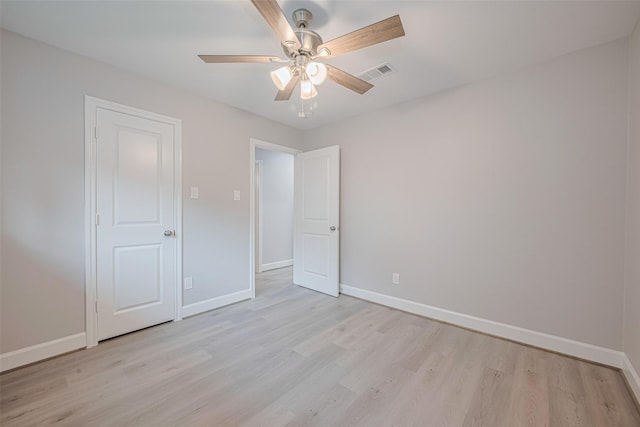 8314 Burning Hills Dr, Houston, TX 77071 - unfurnished bedroom with light wood finished floors, baseboards, and a ceiling fan