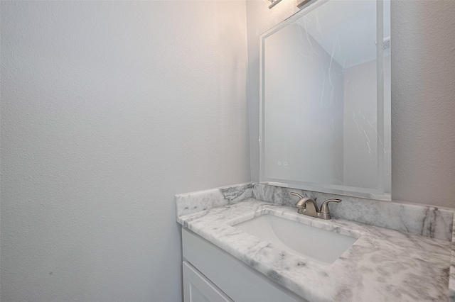 8314 Burning Hills Dr, Houston, TX 77071 - bathroom with vanity and a textured wall