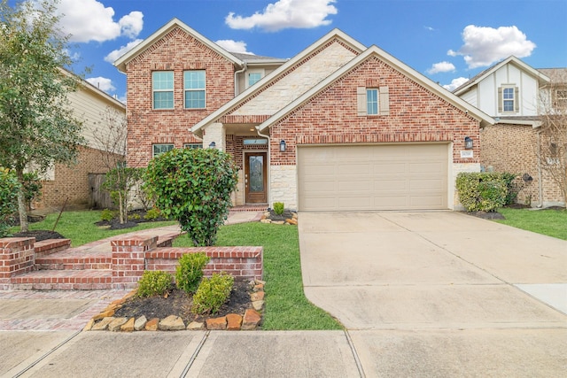 16719 Highland Country Dr, Cypress, TX 77433 - traditional home featuring an attached garage, concrete driveway, brick siding, and stone siding