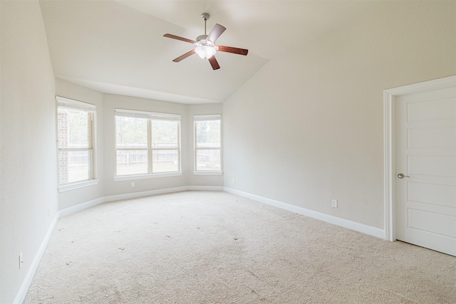 16719 Highland Country Dr, Cypress, TX 77433 - empty room featuring lofted ceiling, carpet floors, a ceiling fan, and baseboards