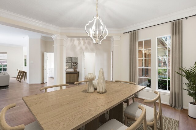 1327 Mission Chase Dr, Houston, TX 77077 - dining room featuring a chandelier, crown molding, ornate columns, wood finished floors, and baseboards