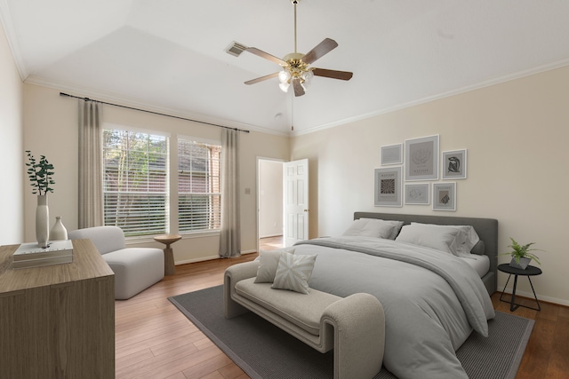 1327 Mission Chase Dr, Houston, TX 77077 - bedroom featuring vaulted ceiling, light wood-style flooring, baseboards, crown molding, and ceiling fan