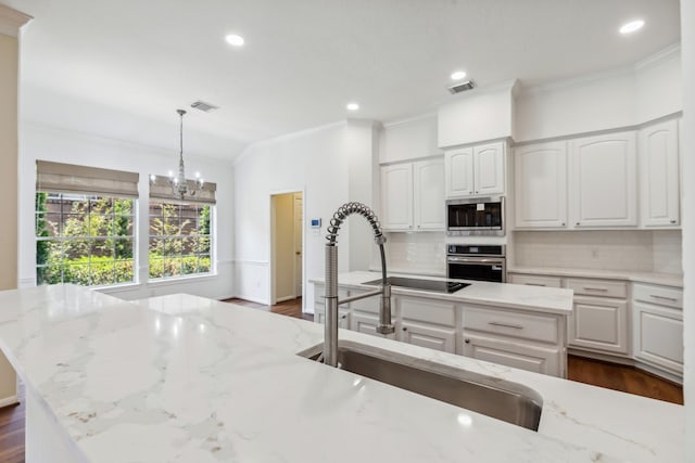 1327 Mission Chase Dr, Houston, TX 77077 - kitchen with stainless steel appliances, a sink, dark wood-style flooring, tasteful backsplash, and ornamental molding