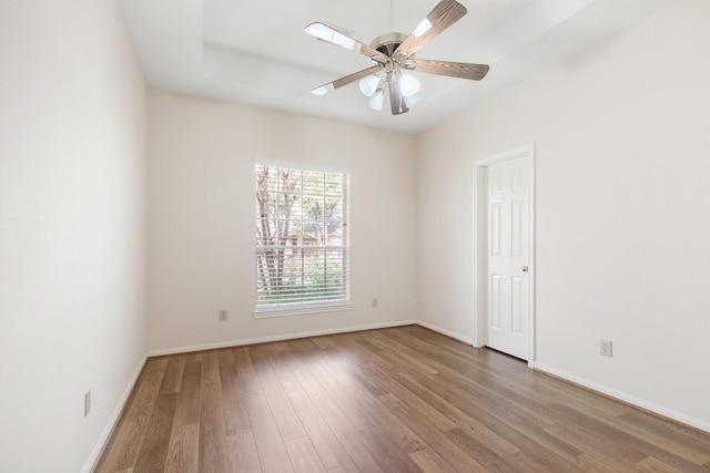 1327 Mission Chase Dr, Houston, TX 77077 - spare room featuring wood finished floors, baseboards, and ceiling fan