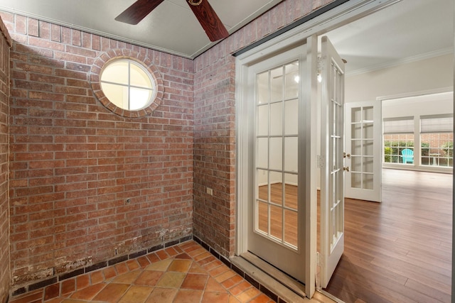 1327 Mission Chase Dr, Houston, TX 77077 - entryway with brick wall, ceiling fan, ornamental molding, and french doors
