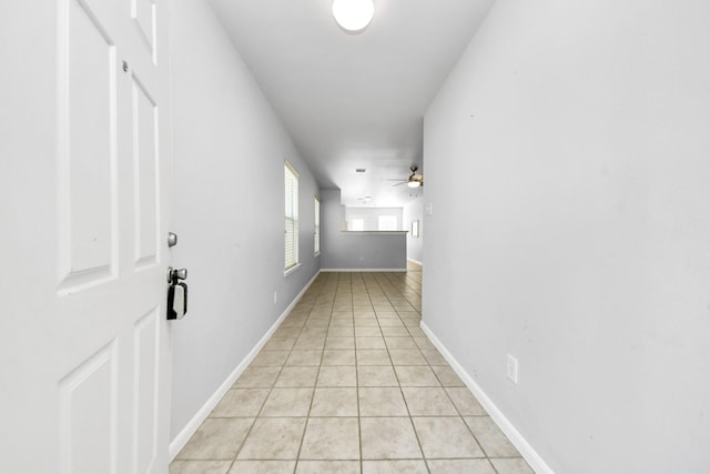 12047 Madison Oak St, Houston, TX 77038 - corridor featuring light tile patterned floors