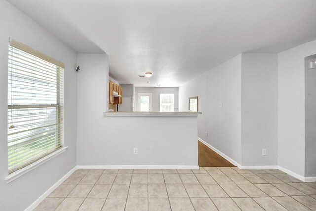 12047 Madison Oak St, Houston, TX 77038 - unfurnished room featuring light tile patterned floors and baseboards
