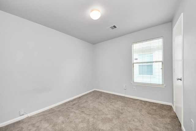 12047 Madison Oak St, Houston, TX 77038 - carpeted spare room featuring baseboards