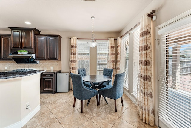 10827 Naburn Gate, Richmond, TX 77407 - dining space with light tile patterned flooring, recessed lighting, and baseboards