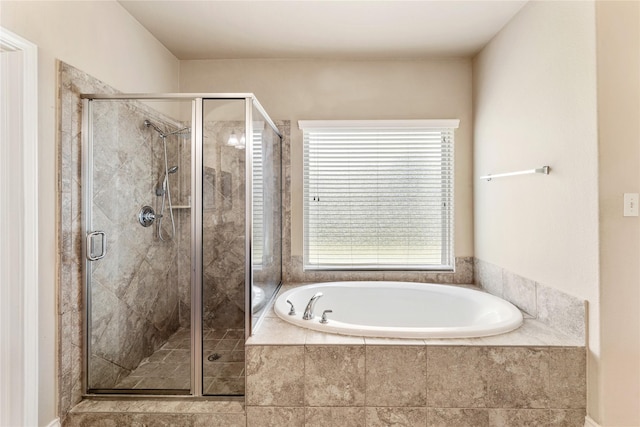 10827 Naburn Gate, Richmond, TX 77407 - bathroom featuring a bath and a shower stall