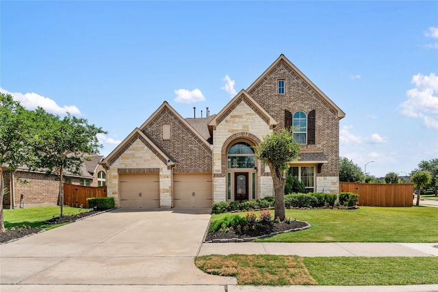 10827 Naburn Gate, Richmond, TX 77407 - french provincial home featuring stone siding, driveway, a garage, and brick siding