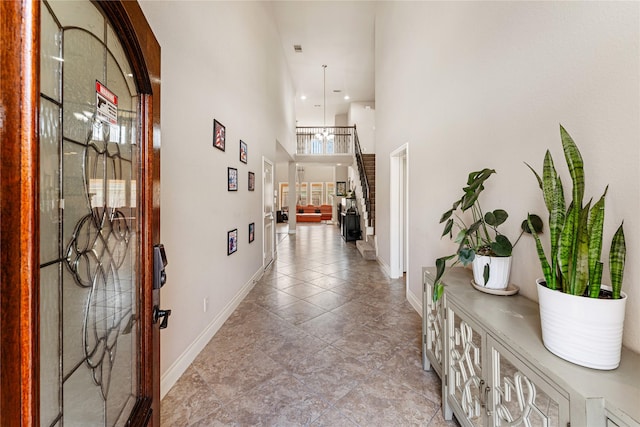 10827 Naburn Gate, Richmond, TX 77407 - hall with a towering ceiling, baseboards, light tile patterned floors, and recessed lighting