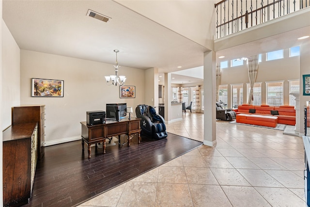 10827 Naburn Gate, Richmond, TX 77407 - office area with baseboards, a chandelier, and tile patterned floors
