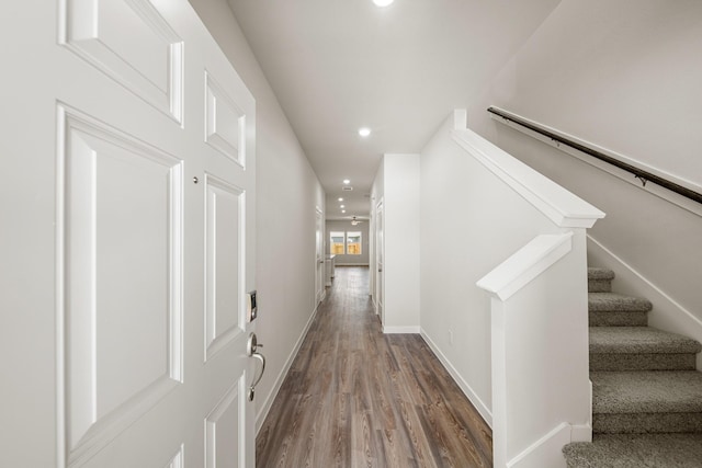 752 Westpointe Dr, Dayton, TX 77535 - hall featuring wood finished floors, recessed lighting, baseboards, and stairs