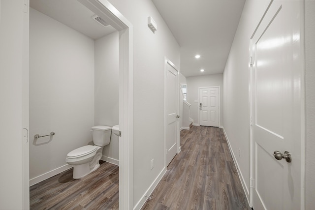 752 Westpointe Dr, Dayton, TX 77535 - corridor featuring wood finished floors, baseboards, and recessed lighting