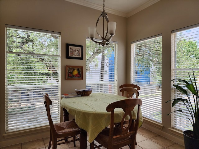 2722 Crawford St, Houston, TX 77004 - dining space featuring light tile patterned flooring and crown molding