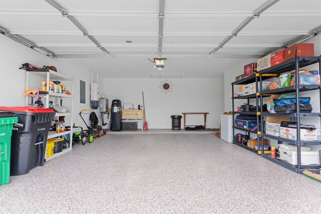 30114 Ousel Falls Ln, Fulshear, TX 77494 - garage with electric panel and a garage door opener