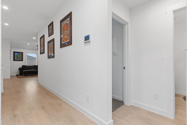 30114 Ousel Falls Ln, Fulshear, TX 77494 - hallway featuring light wood finished floors, recessed lighting, and baseboards