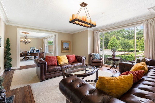 1403 N Thompson St, Conroe, TX 77301 - living area featuring a chandelier, crown molding, wood finished floors, and baseboards