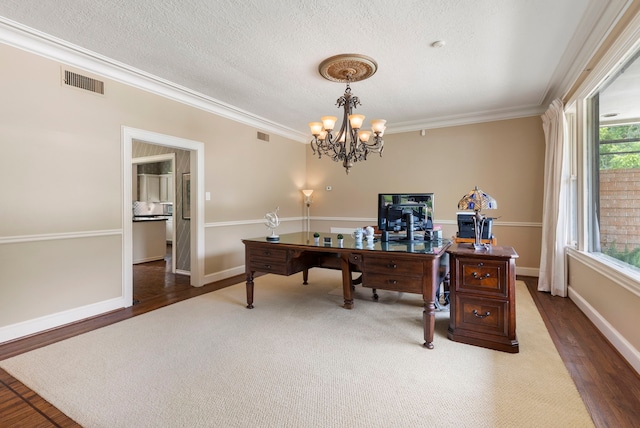 1403 N Thompson St, Conroe, TX 77301 - home office with wood finished floors, a chandelier, crown molding, baseboards, and a textured ceiling
