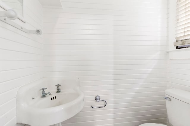1403 N Thompson St, Conroe, TX 77301 - half bathroom featuring toilet