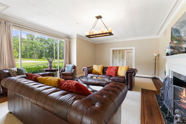 1403 N Thompson St, Conroe, TX 77301 - living area featuring a premium fireplace, ornamental molding, wood finished floors, and baseboards