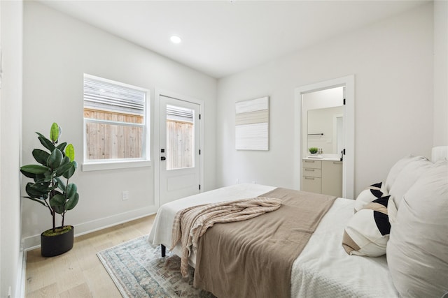 3907D Tulane St, Houston, TX 77018 - bedroom with light wood-style flooring, baseboards, recessed lighting, and connected bathroom