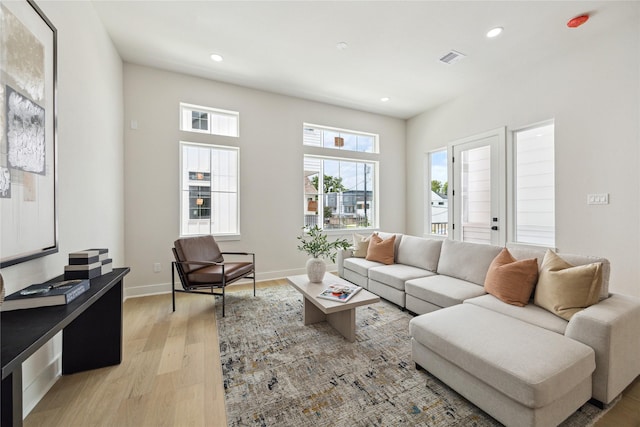 3907D Tulane St, Houston, TX 77018 - living area with light wood finished floors, recessed lighting, and baseboards