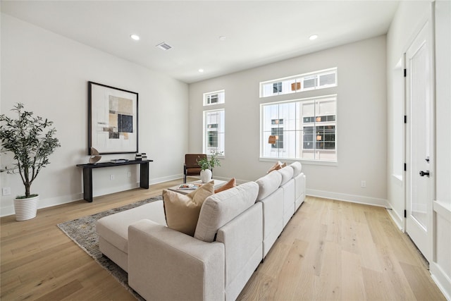 3907D Tulane St, Houston, TX 77018 - living area featuring light wood-style flooring, recessed lighting, healthy amount of natural light, and baseboards