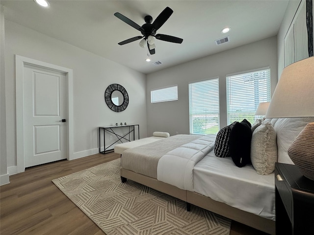 1803 Brooks St, Houston, TX 77026 - bedroom featuring wood finished floors, recessed lighting, baseboards, and a ceiling fan
