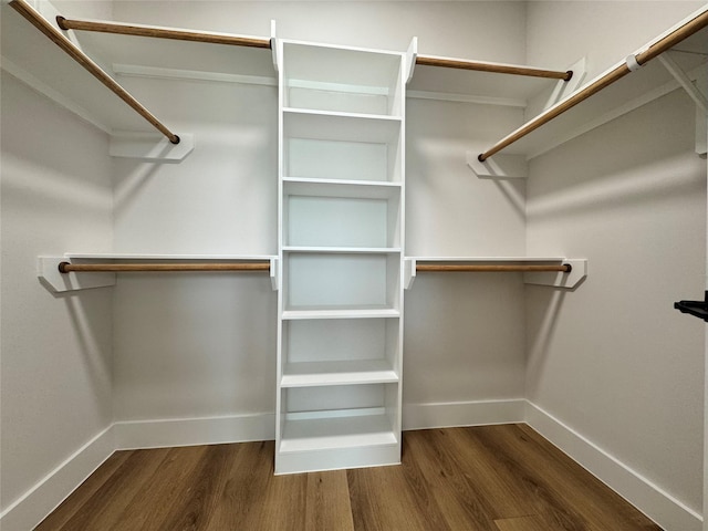 1803 Brooks St, Houston, TX 77026 - spacious closet featuring wood finished floors