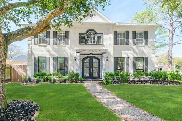 502 Lee Shore Ln, Houston, TX 77079 - view of front of house with french doors and brick siding