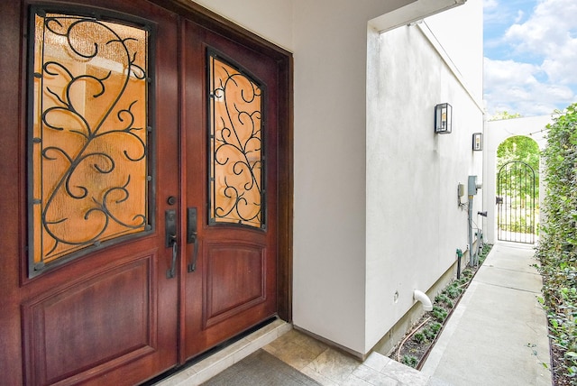 4220 Law St, Houston, TX 77005 - property entrance with stucco siding and a gate